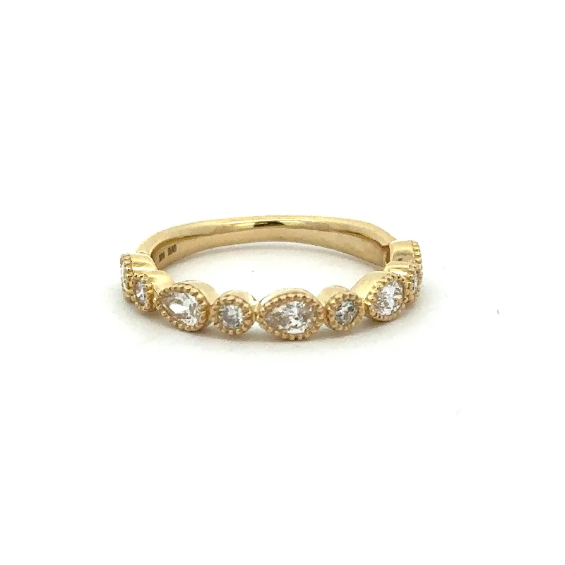 Premium Jewelry Now Available At Special Discounts Pear and Round Cut Diamond Band in Yellow Gold Premium Jewelry Now Available At Special Discounts Pear and Round Cut Diamond Band in Yellow Gold