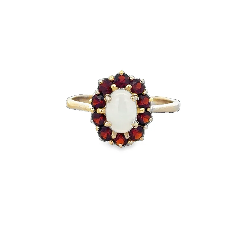 Huge Savings On Timeless Jewelry Collections Opal and Garnet Halo Ring in Yellow Gold