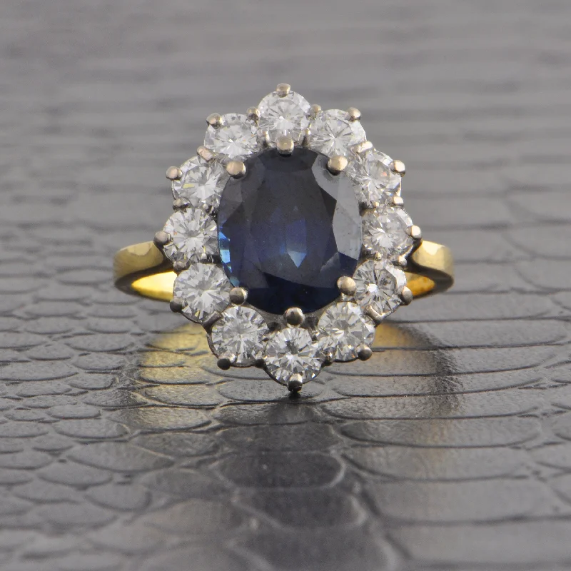 Luxury Jewelry Without The Luxury Price Tag Statement Blue Sapphire and Diamond Ring in 18k Gold