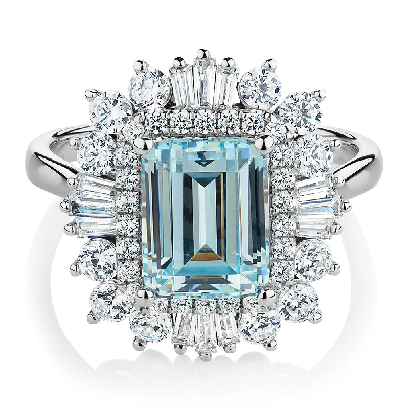 Unique Jewelry Designs Now At Discounted Rates Dress ring with 9x7mm aquamarine simulant and 1.43 carats* of diamond simulants in 10 carat white gold