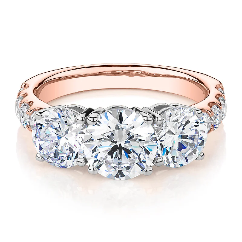 Seasonal Jewelry Clearance – Best Styles At The Lowest Prices Three stone ring with 3.44 carats* of diamond simulants in 10 carat rose and white gold