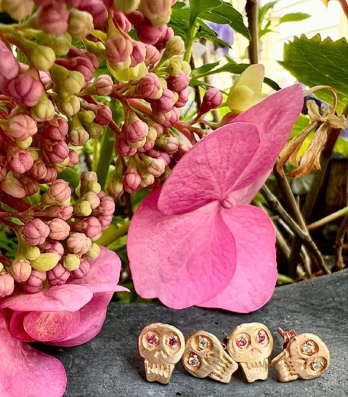 Get Your Favorite Jewelry At The Best Price Charmed Skull Stud Earrings - 14k Gold + Pink Sapphires