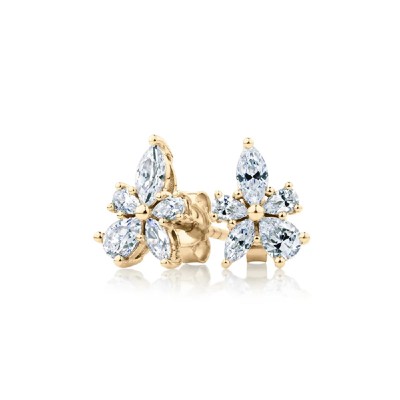 Versatile Layering Jewelry For Effortless Chic Marquise and Pear stud earrings with 1.42 carats* of diamond simulants in 10 carat yellow gold