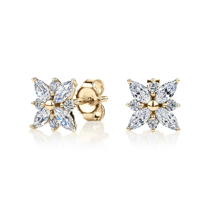 Affordable Glamour – Must-Have Jewelry At Special Rates Round Brilliant and Marquise stud earrings with 0.84 carats* of diamond simulants in 10 carat yellow gold