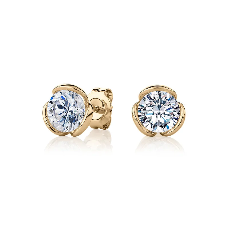 Don't Miss Out – Shop Elegant Jewelry For Less Round Brilliant stud earrings with 2 carats* of diamond simulants in 10 carat yellow gold