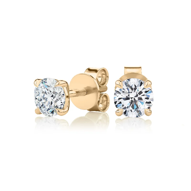 Trendy And Classic Jewelry Now At Reduced Prices Signature Simulant Diamond 1.40 carat* TW round brilliant stud earrings in 14 carat yellow gold Trendy And Classic Jewelry Now At Reduced Prices Signature Simulant Diamond 1.40 carat* TW round brilliant stud earrings in 14 carat yellow gold
