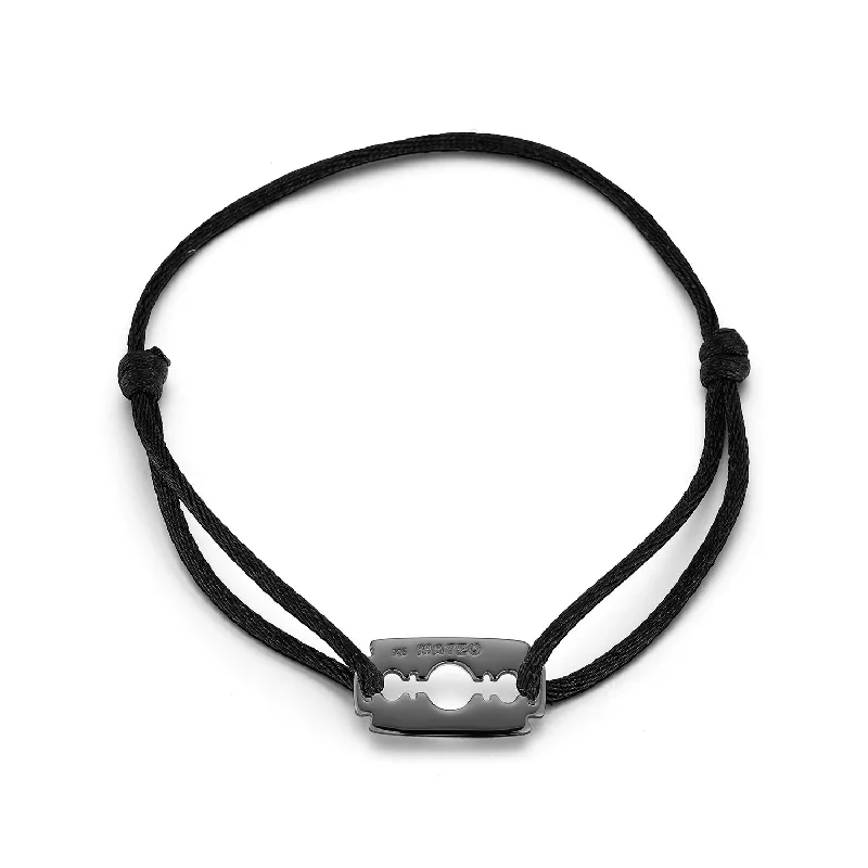 Timeless Elegance Now At Special Discounts Blacken Razor Blade on Black Nylon Bracelet Timeless Elegance Now At Special Discounts Blacken Razor Blade on Black Nylon Bracelet