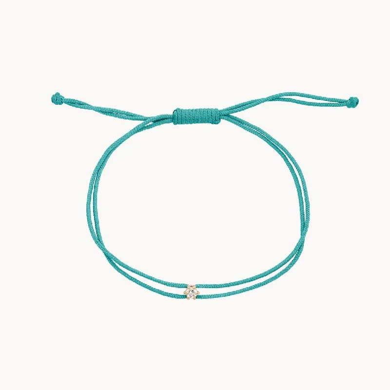 Your Perfect Accessory At The Perfect Price the nova diamond teal cord bracelet - yellow gold, diamond, teal nylon Your Perfect Accessory At The Perfect Price the nova diamond teal cord bracelet - yellow gold, diamond, teal nylon