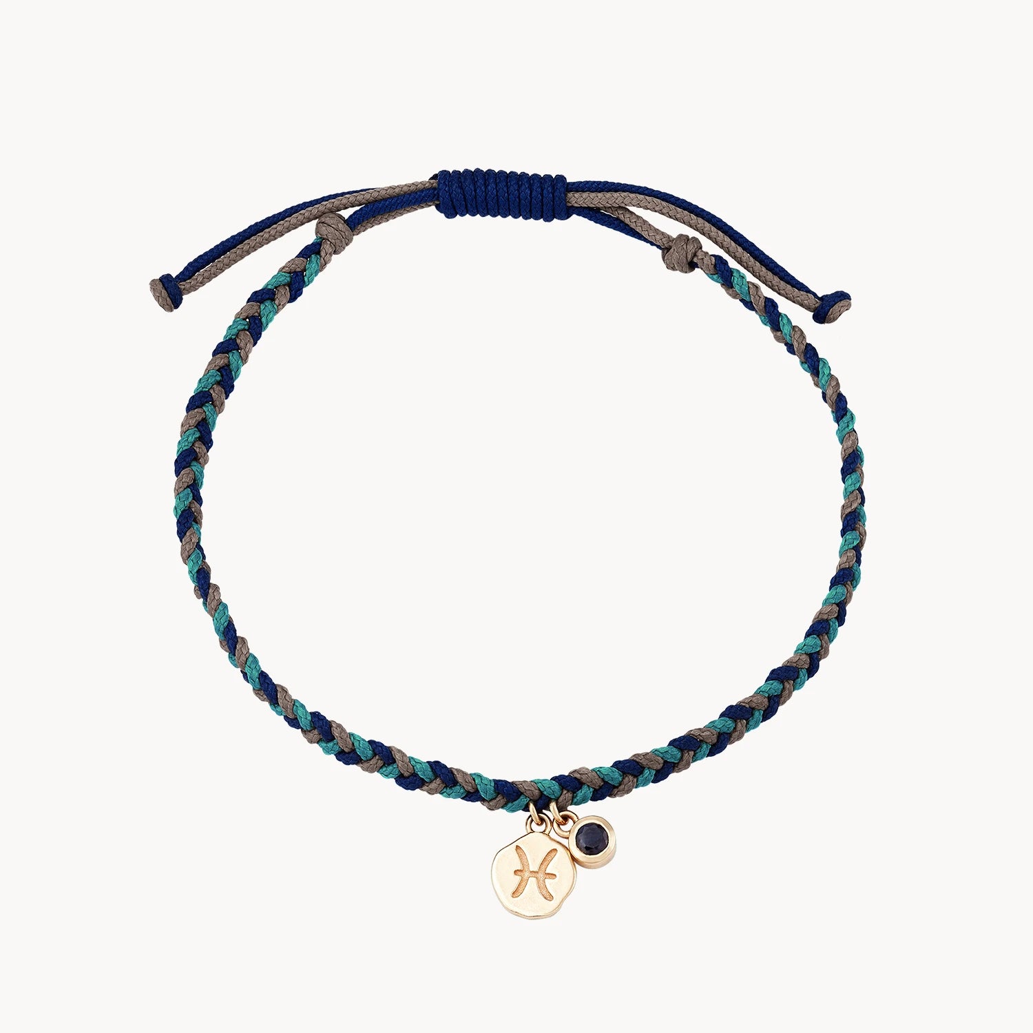Affordable Elegance – Premium Jewelry At Special Prices pisces zodiac water element cord bracelet - 10k yellow gold, blue sapphire, cord Affordable Elegance – Premium Jewelry At Special Prices pisces zodiac water element cord bracelet - 10k yellow gold, blue sapphire, cord