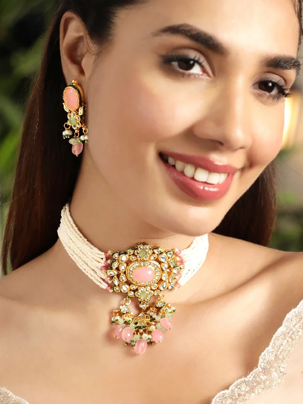 Grab Exquisite Jewelry At The Lowest Prices Rubans 22K Gold plated pastel pink gemstone with kundan and pearls regal Necklace set Grab Exquisite Jewelry At The Lowest Prices Rubans 22K Gold plated pastel pink gemstone with kundan and pearls regal Necklace set