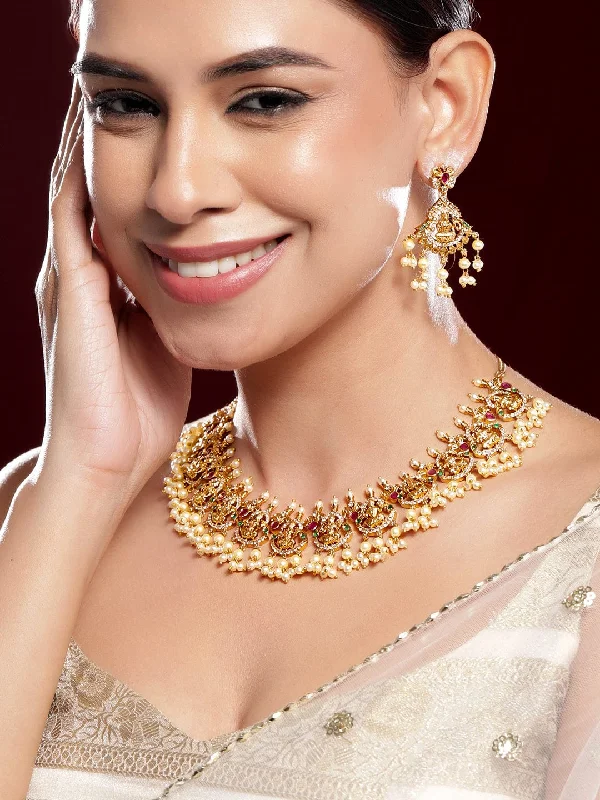 Get Your Favorite Jewelry At The Best Price Rubans 22K Gold-Plated Ruby Pink, Emerald Green & White Cubic Zirconia Studded Divine Lakshmi Motif Temple Necklace Set Get Your Favorite Jewelry At The Best Price Rubans 22K Gold-Plated Ruby Pink, Emerald Green & White Cubic Zirconia Studded Divine Lakshmi Motif Temple Necklace Set