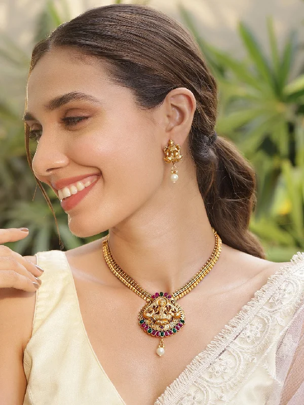Limited-Time Offer On Elegant Jewelry Pieces Rubans 22KT Gold Plated Red & Green Stone Studded Lakshmi Motif Temple Necklace Set Limited-Time Offer On Elegant Jewelry Pieces Rubans 22KT Gold Plated Red & Green Stone Studded Lakshmi Motif Temple Necklace Set