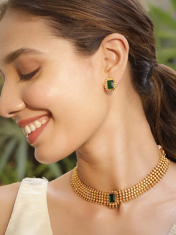 Trending Jewelry Styles Now At Limited-Time Discounts 22KT Gold Plated Brass Emerald Stone Studded Intricate Necklace With Earrings Set Trending Jewelry Styles Now At Limited-Time Discounts 22KT Gold Plated Brass Emerald Stone Studded Intricate Necklace With Earrings Set