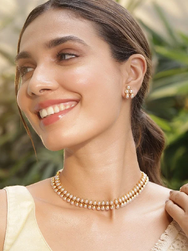 Premium Jewelry Now Available At Special Discounts Gold Toned Brass White Beaded Floral Necklace Set. Premium Jewelry Now Available At Special Discounts Gold Toned Brass White Beaded Floral Necklace Set.